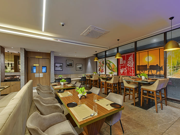 Atlas World Café at VIVIDUS Sleek Aarya Mansion