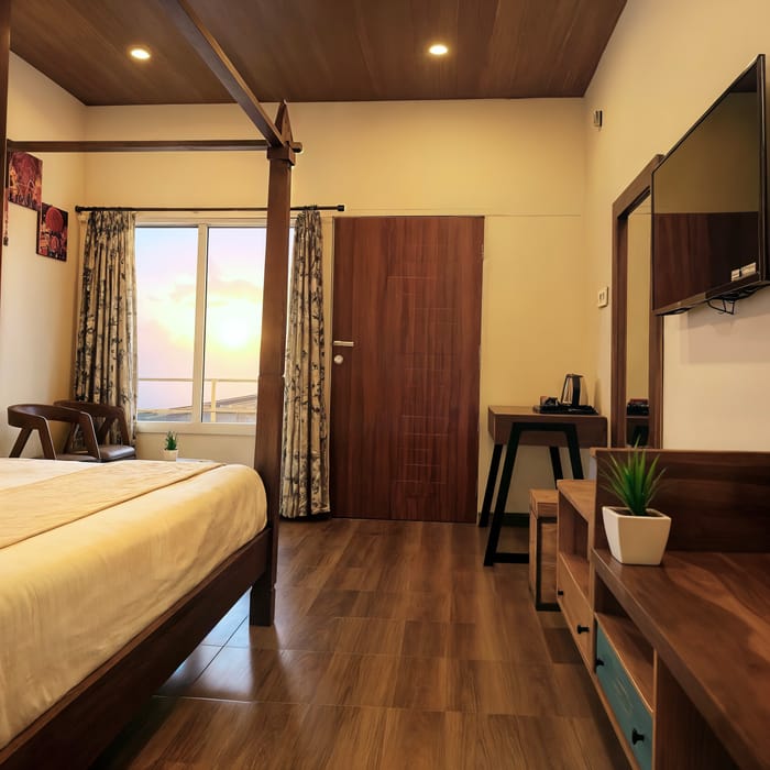 Neatly arranged in-room amenities, including a kettle and toiletries, in a Superior Room at Nazaara Nature Retreat.