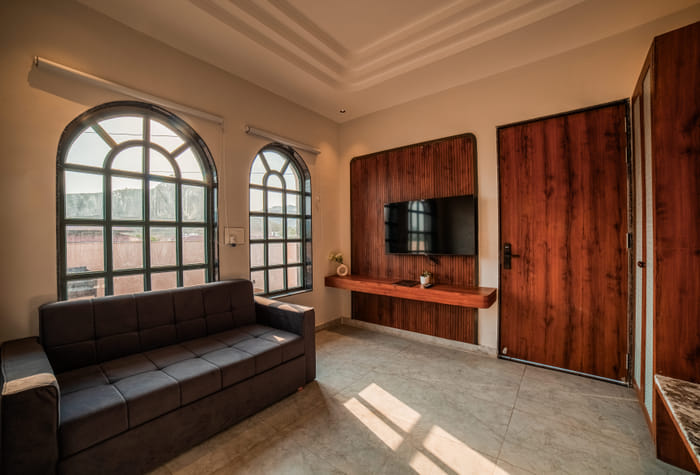 Living room TV unit in the Nazaara Royal Suite at Nazaara Hills Retreat, Udaipur.