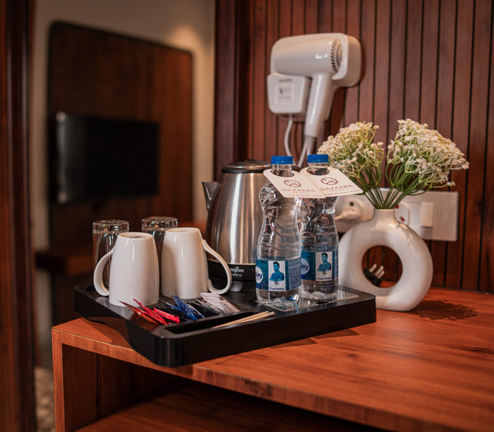Minibar and tea and coffee station in the Nazaara Royal Suite at Nazaara Hills Retreat, Udaipur.