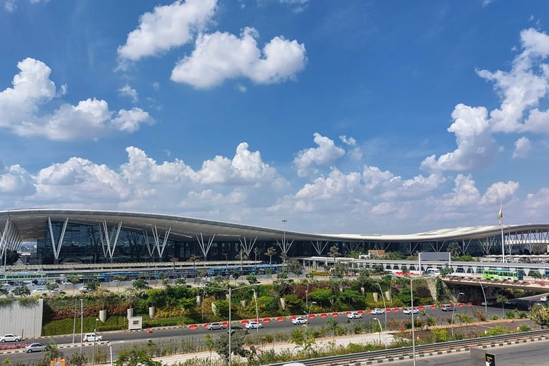 Terminal building of Kempegowda International Airport under a blue sky