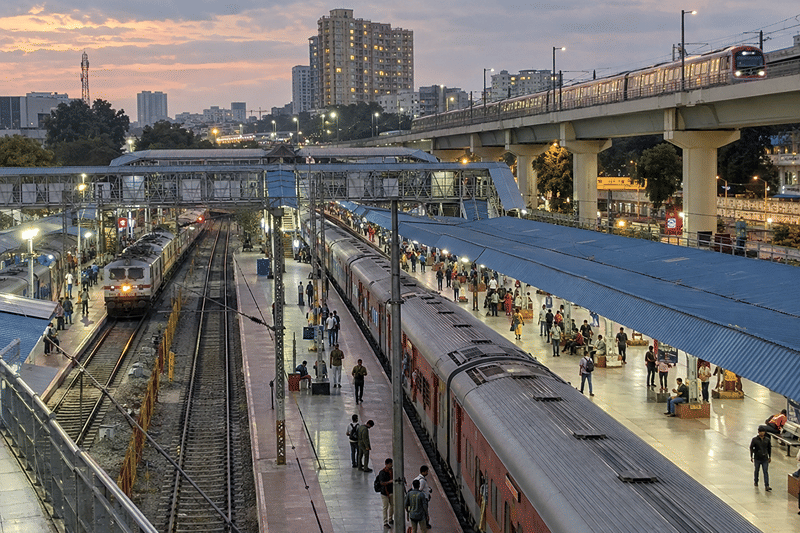 Trains and platforms at KSR Bengaluru City Junction at dusk