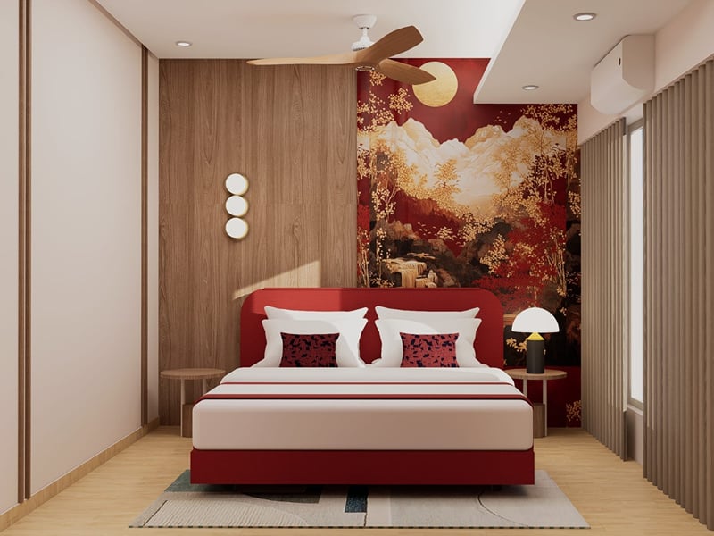 Suite bedroom with a red upholstered king bed against a mountain-scene mural | Shirgaonkar Beach Resort
