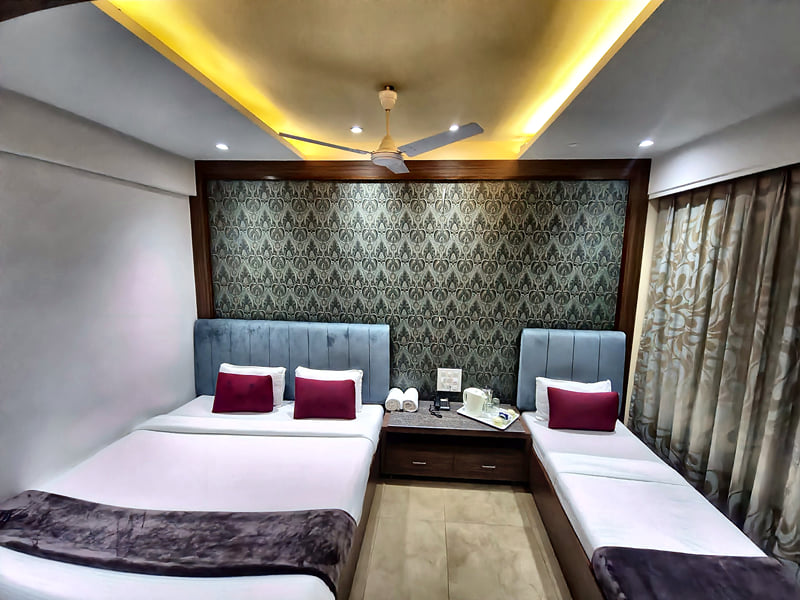 Privilege Triple Club Room front view with cove-lit ceiling