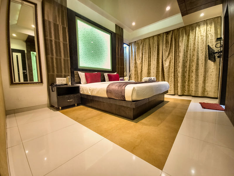 Superior Royal Double Bed Room with a double bed and backlit wall panel