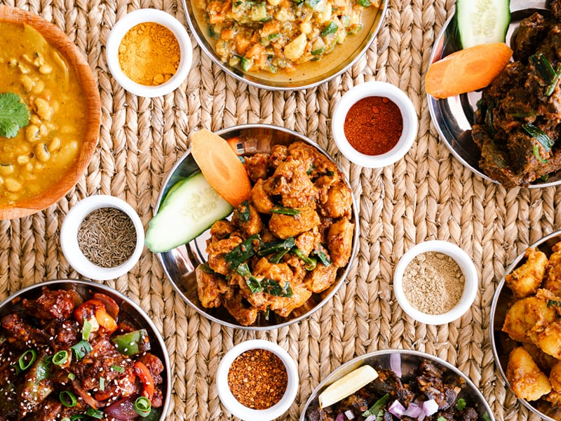 Curries and spice bowls at Suraj Kitchen, Hotel City Heart