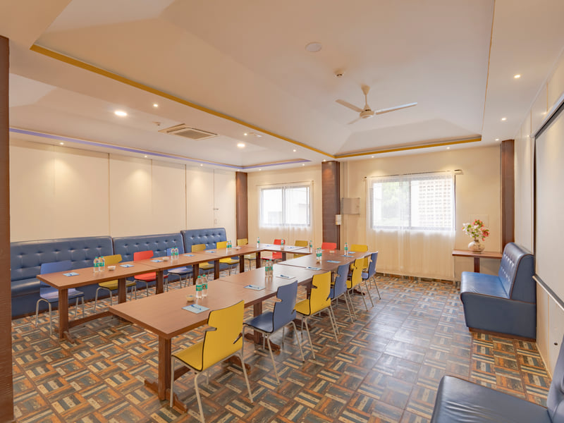 The conference room with its coloured chairs