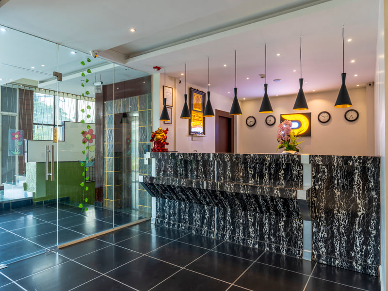 The reception desk under pendant lights