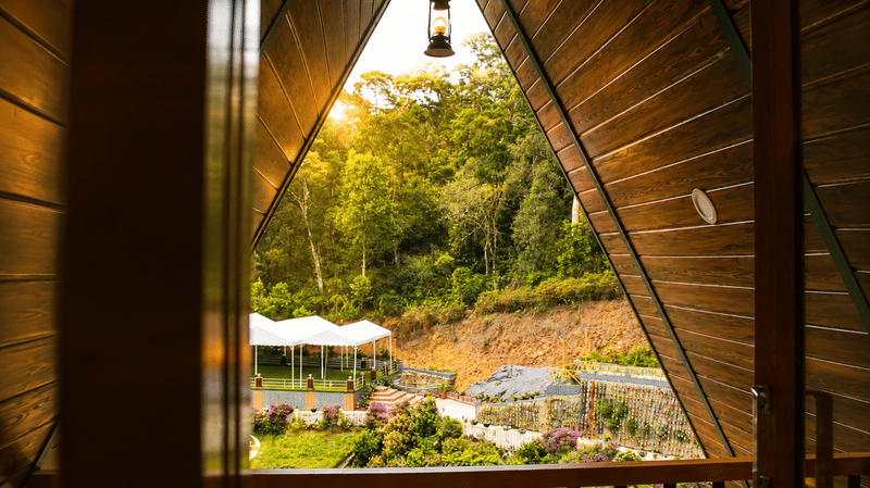 View over the estate gardens through the A-frame window