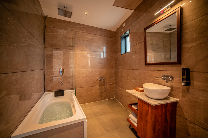 Private jacuzzi tub in the Nazaara Royal Suite bathroom at Nazaara Hills Retreat, Udaipur
