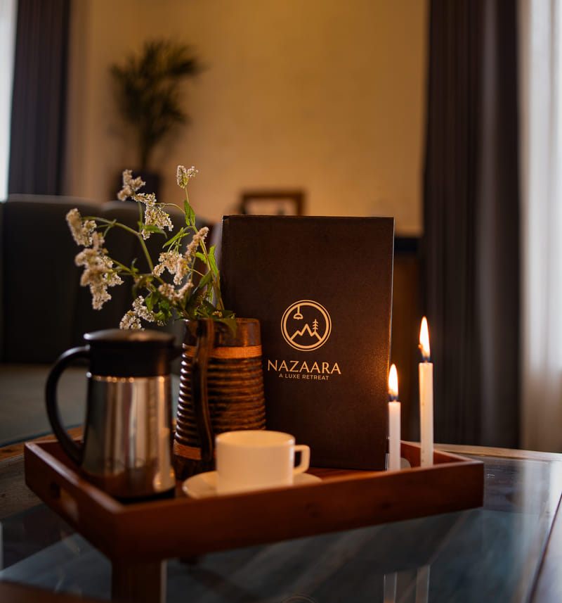 An in-room dining menu at Nazaara Luxe Retreat