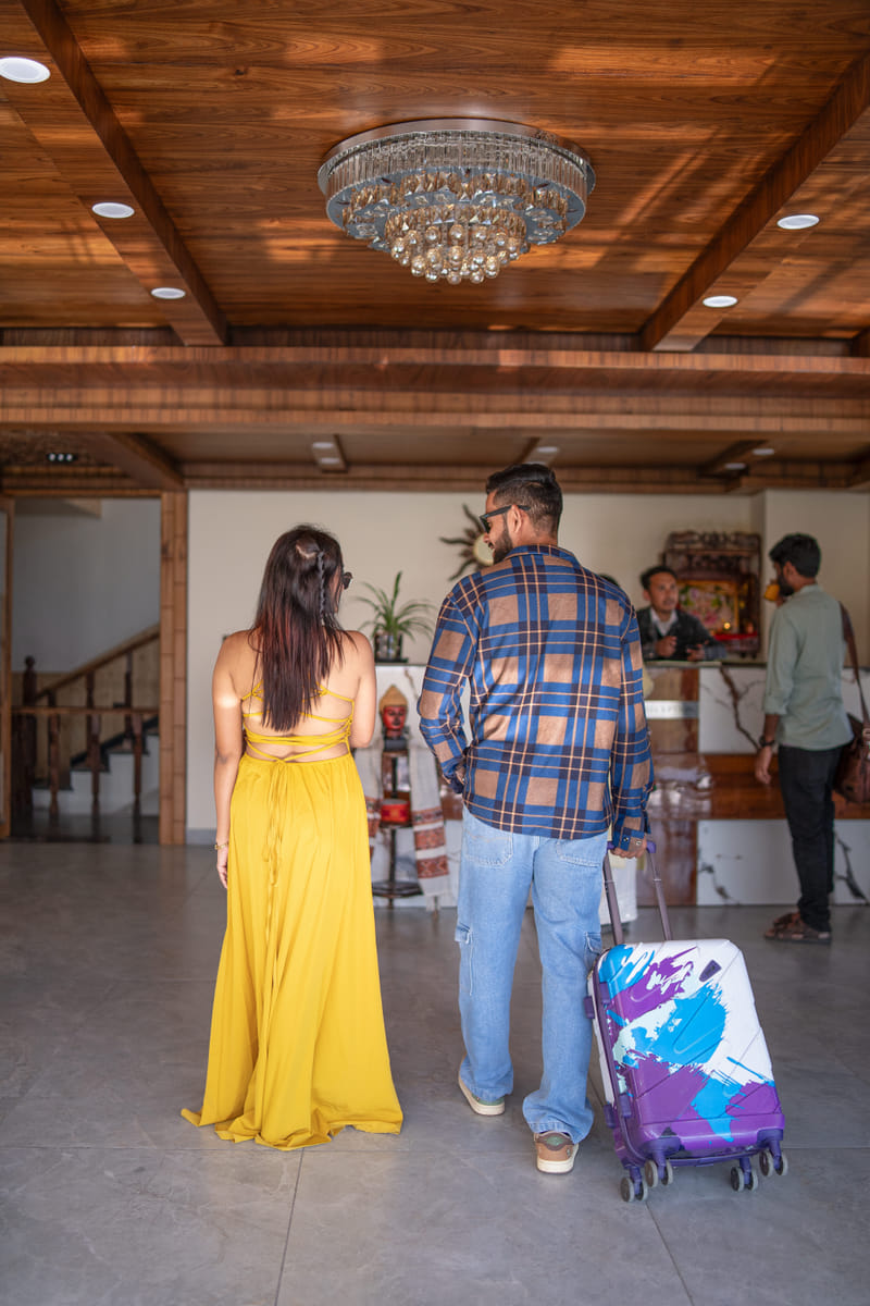 Guests walking through the reception area of Nazaara Luxe Retreat after checking in