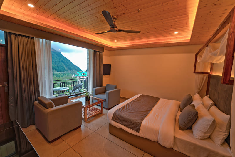 Superior Room ceiling fan and lounge corner at Nazaara Luxe Retreat