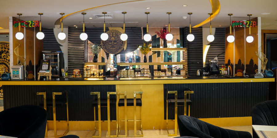 The gold and black bar at Zeus