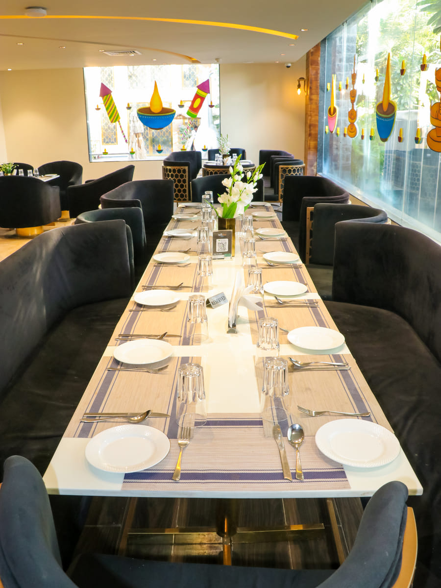 Zeus Restaurant, a long table laid in the fine-dining room