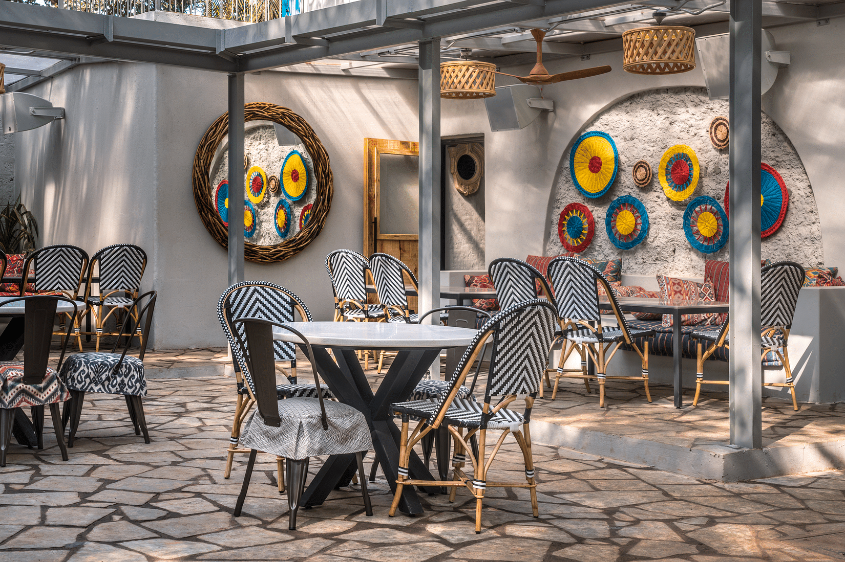 Dining tables set in a restaurant - Villa in Palms by V Escapes