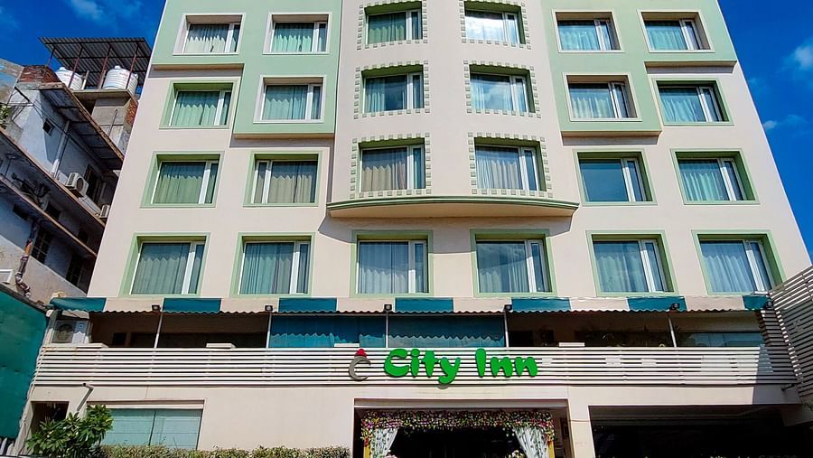  Exterior view of Hotel City Inn, Varanasi, showcasing its multi-storey facade, located in a prime city area with convenient parking.