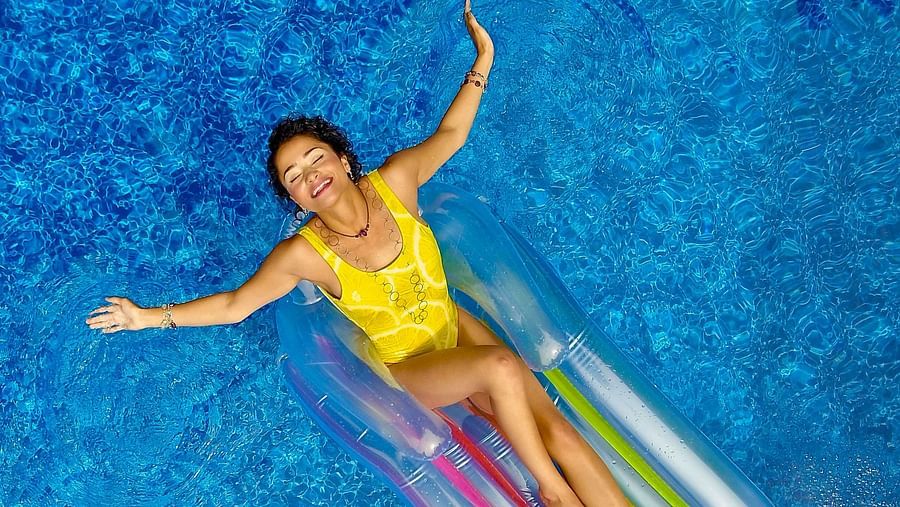 woman chilling in the pool