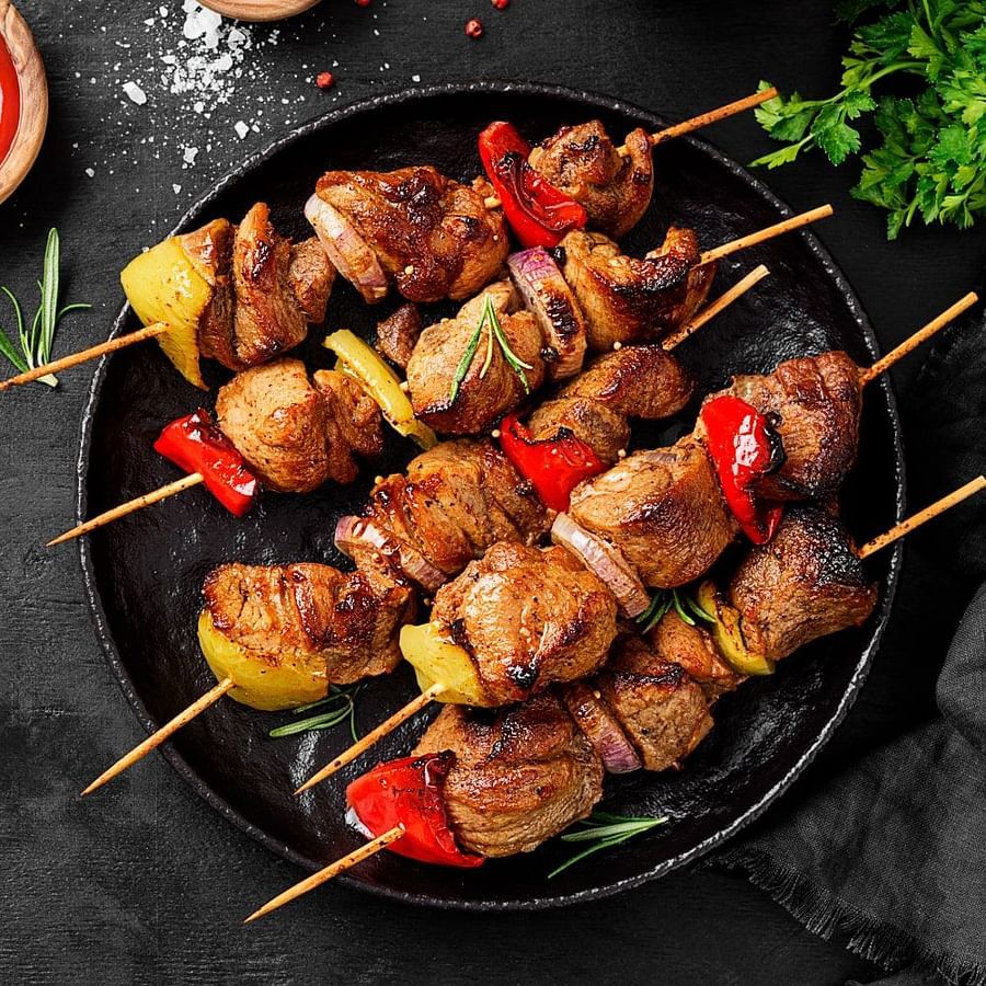 chicken skewers served on a plate