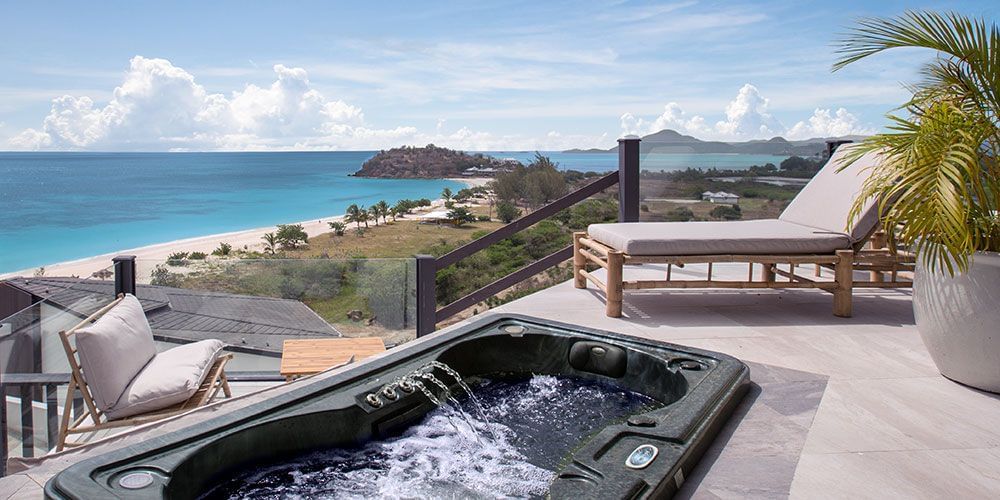 Overview of a private jacuzzi or spa bath on a terrace overlooking the Sea.