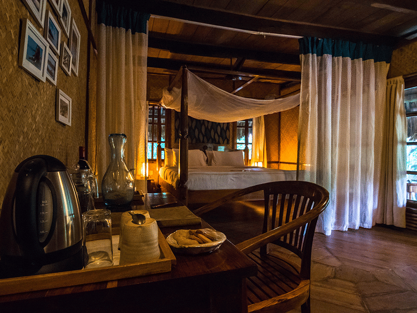 Table and chair in one of the fan-cooled Duplex Cottages at Barefoot at Havelock
