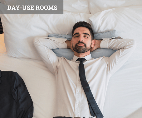 A business traveller using a day-use room