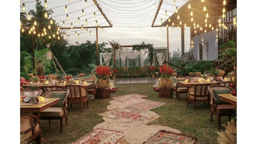 an event area decorated with lights and flowers at Symphony Samudra Beachside Jungle Resort And Spa, Port Blair