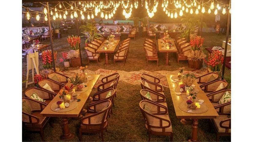 a dining area decorated with lights - Symphony Samudra Beachside Jungle Resort And Spa, Port Blair