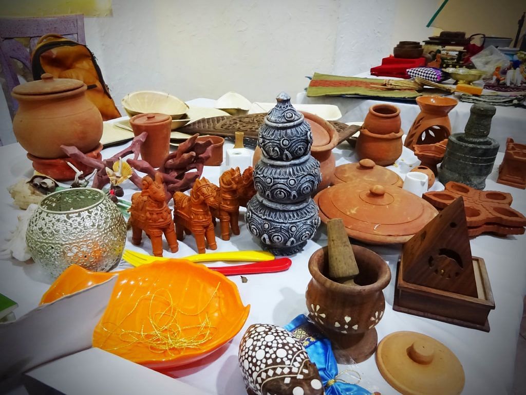 Collection of traditional clay pots, decorative items, and handcrafted artefacts.