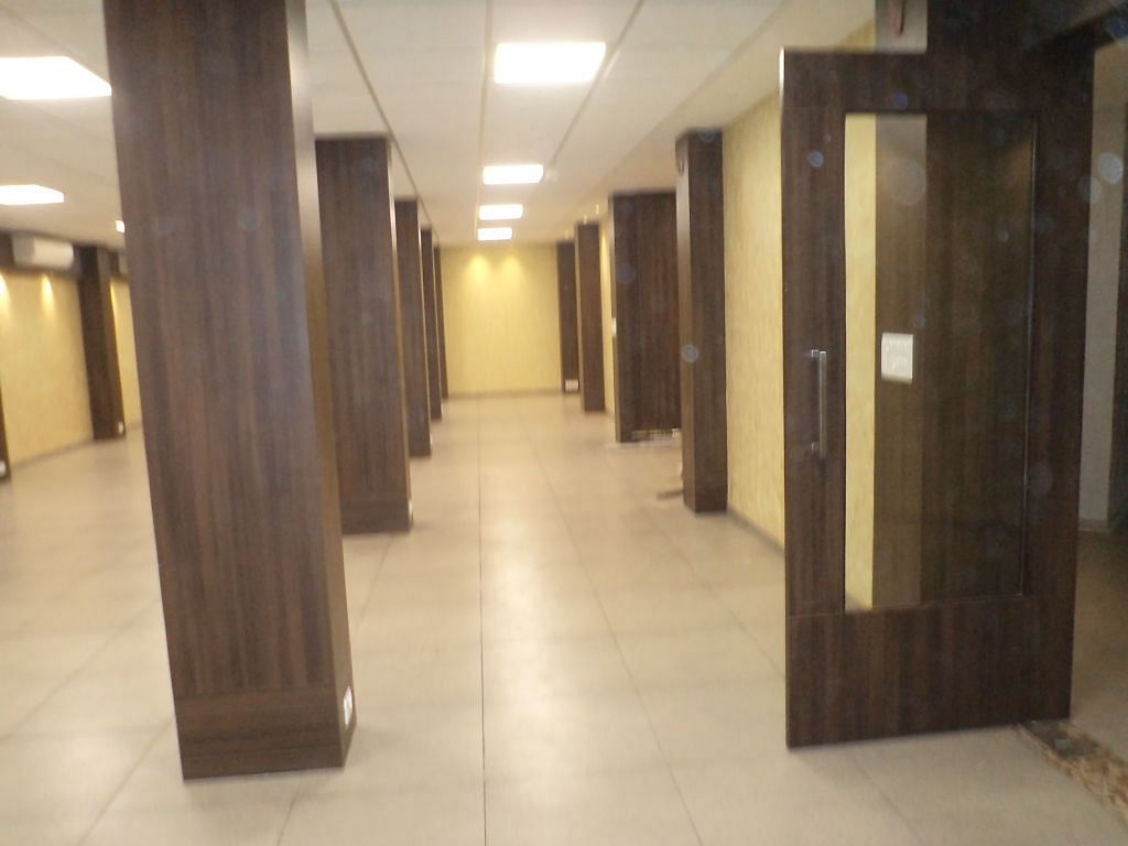 Closer view of banquet hall entrance with wooden paneling