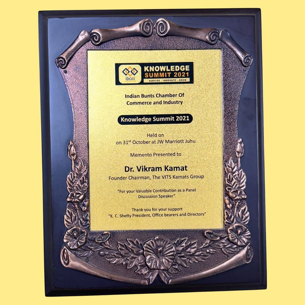 An image of a memento presented to Dr. Vikram Kamat by Knowledge Summit 2021 - Kamats India
