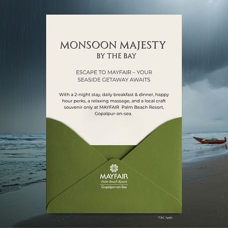 Elegant envelope-style creative for MAYFAIR Monsoon Majesty offer with a serene beach in the background