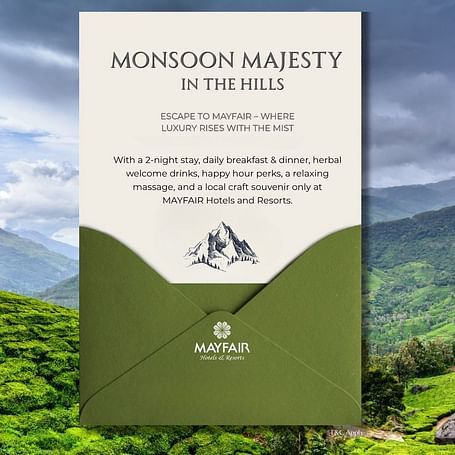 Monsoon Majesty in the Hills – elegant promotional poster from MAYFAIR Hotels featuring seasonal offers for tranquil hill station escapes amidst lush green landscapes.