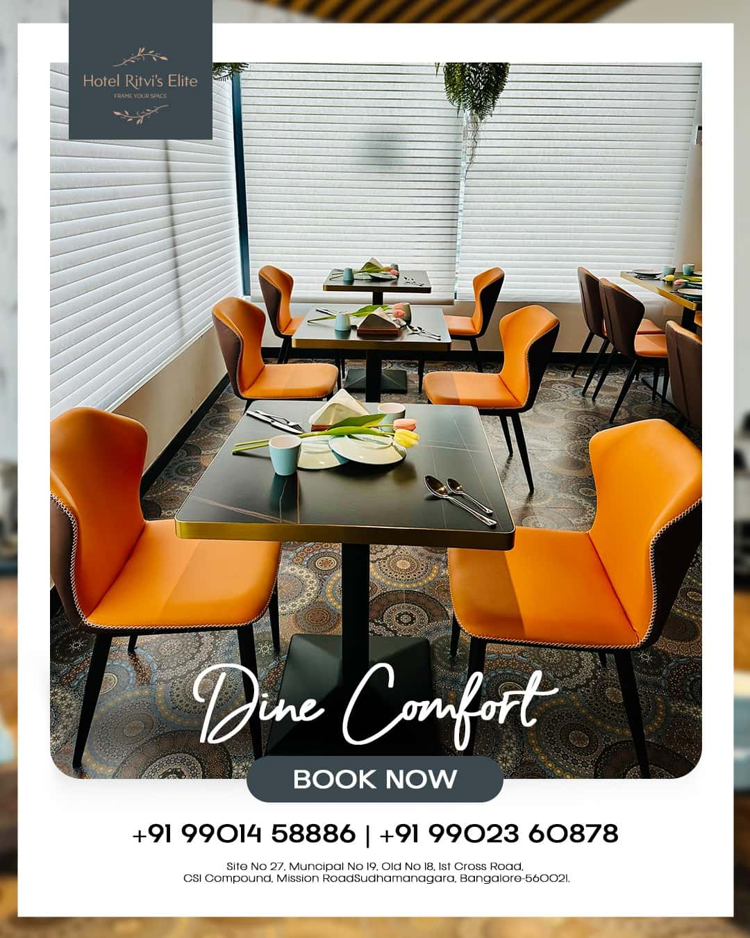 A dining table for four at Hotel Ritvi's Elite set with orange chairs