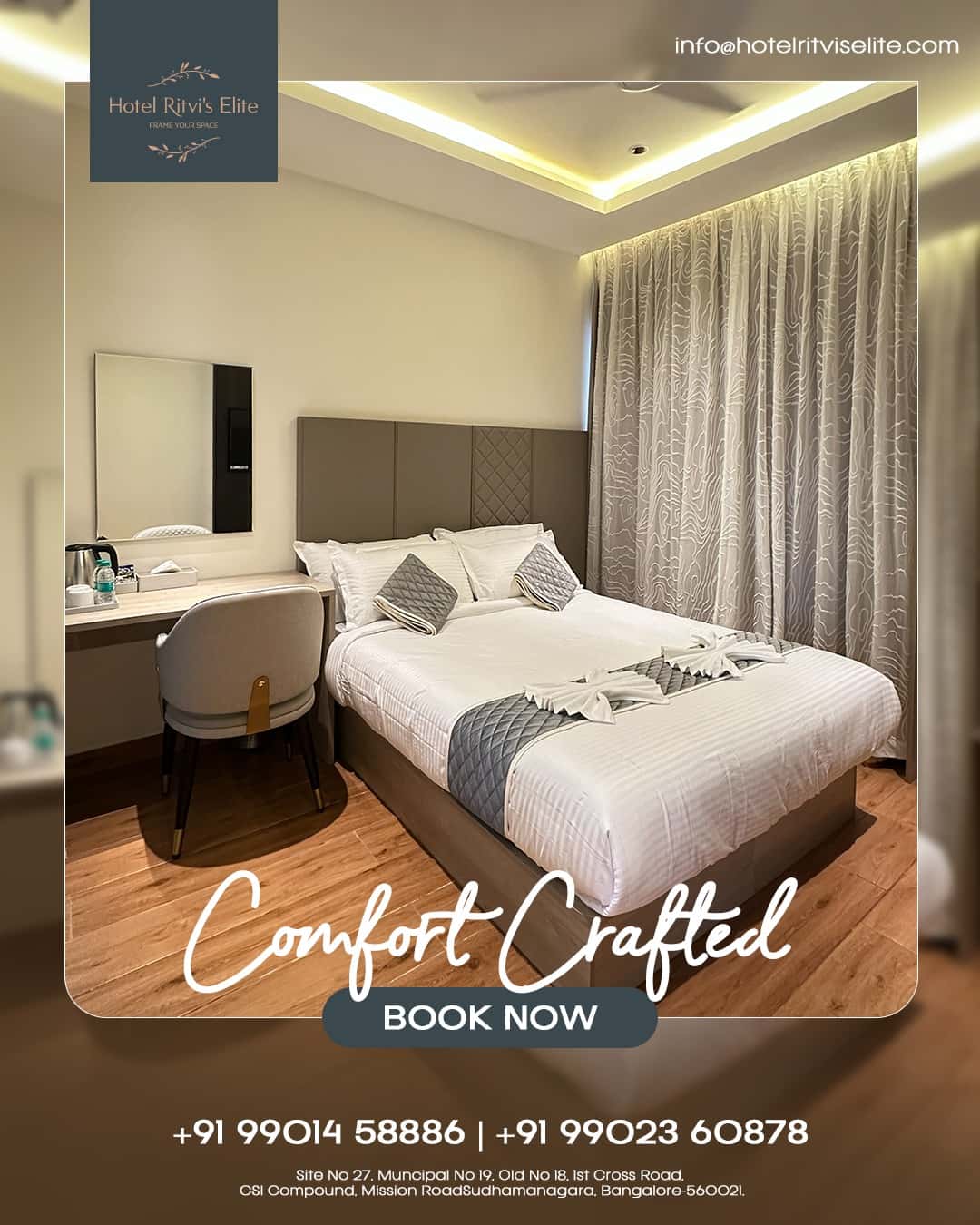 Guest room at Hotel Ritvi's Elite with a wide bed beneath cove lighting