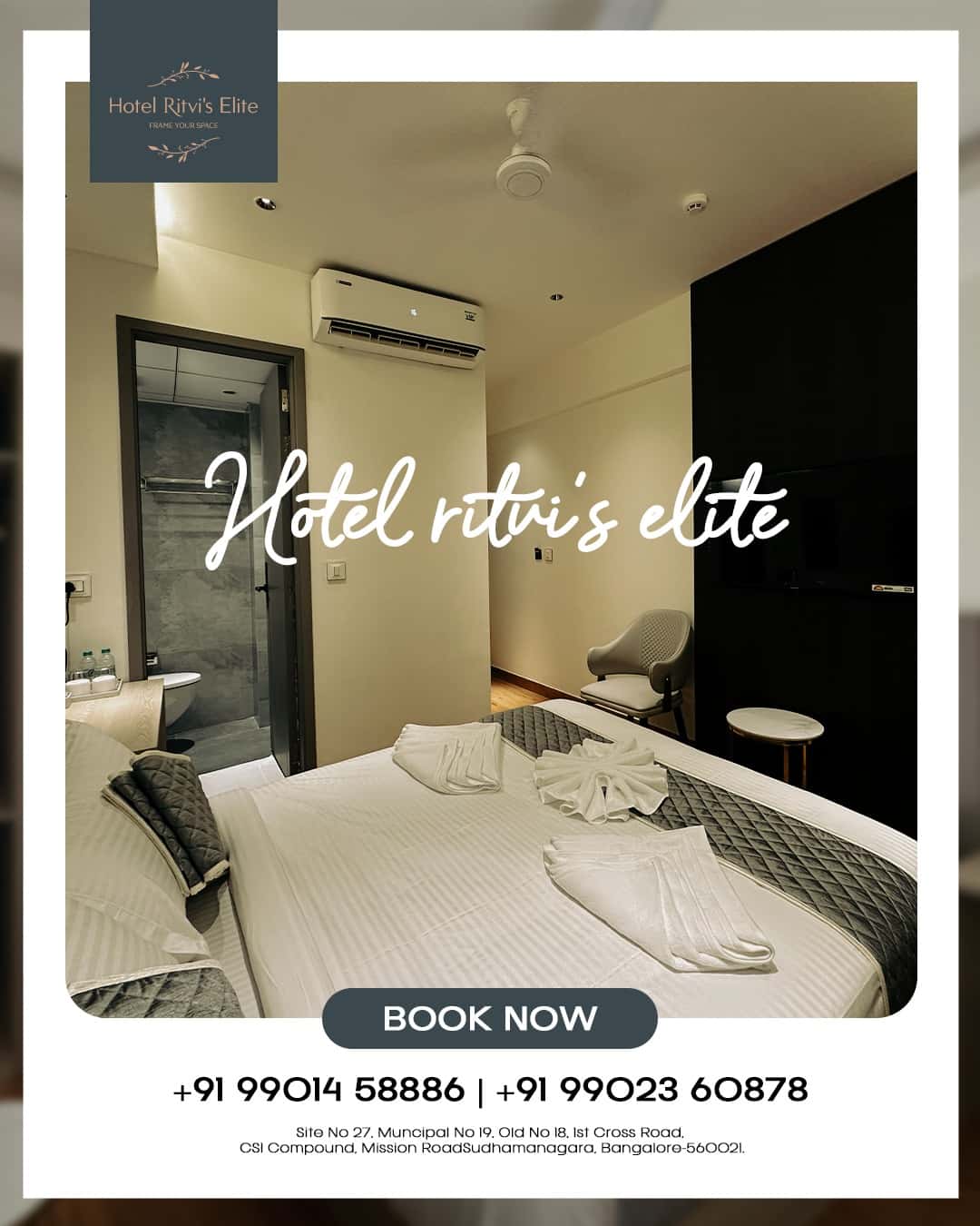 Guest room at Hotel Ritvi's Elite with a wide bed against a dark timber wall