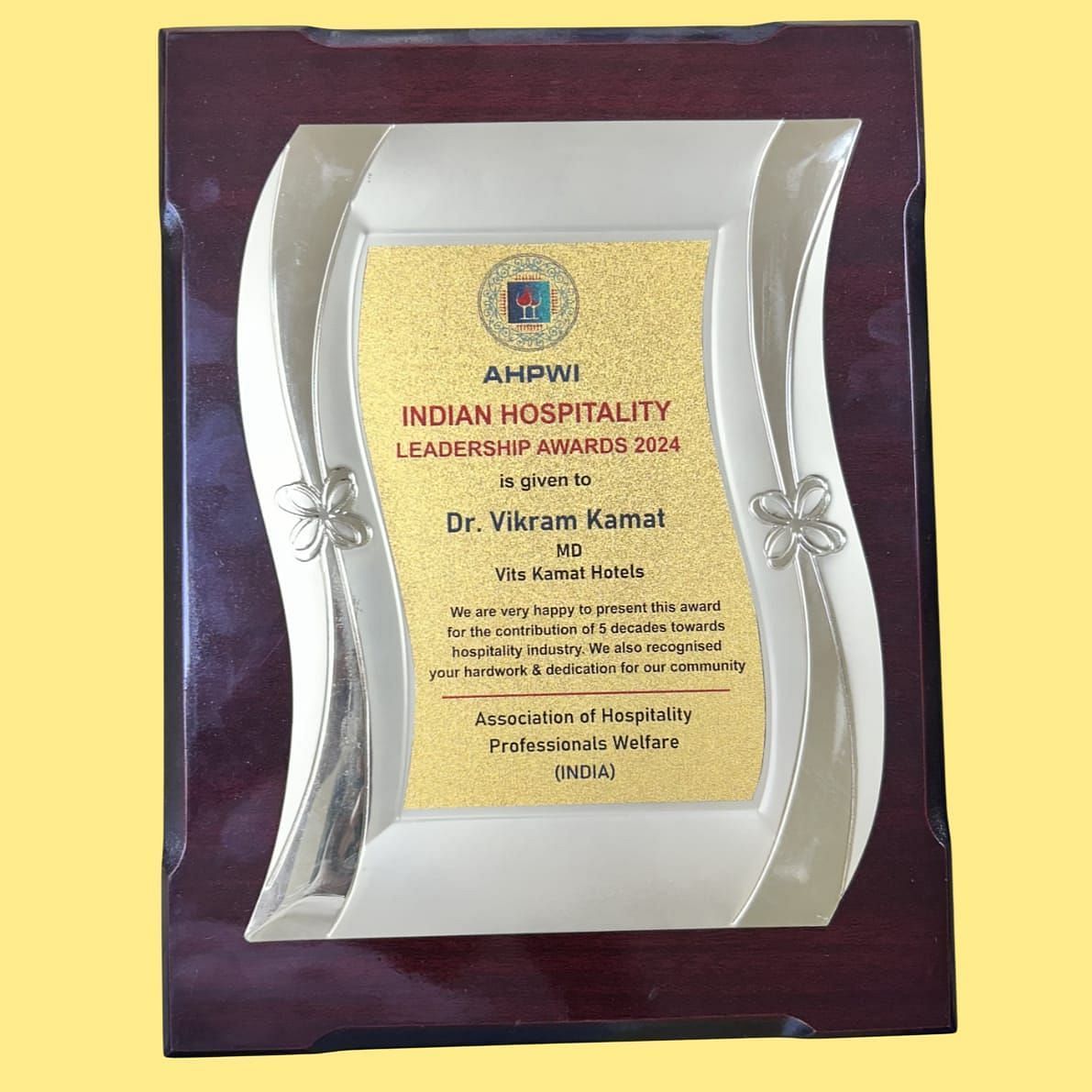An image of Indian Hospitality Leadership award won by Dr. Vikram Kamat - Kamats India
