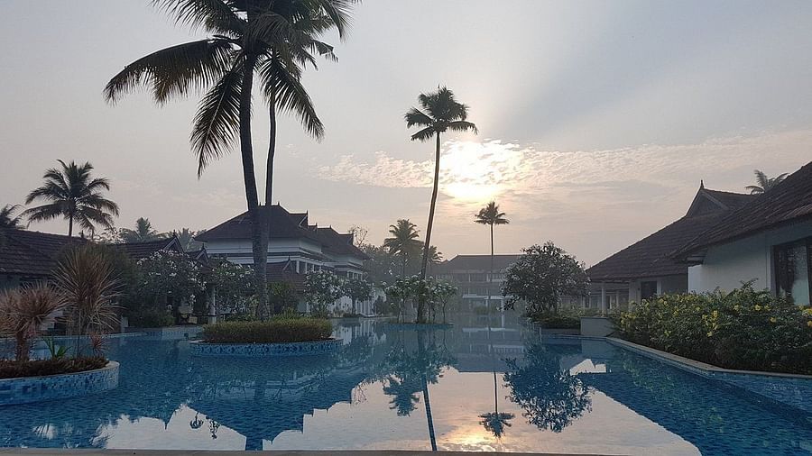 Swimming pool in the middle of a resort - Rhythm Kumarakom