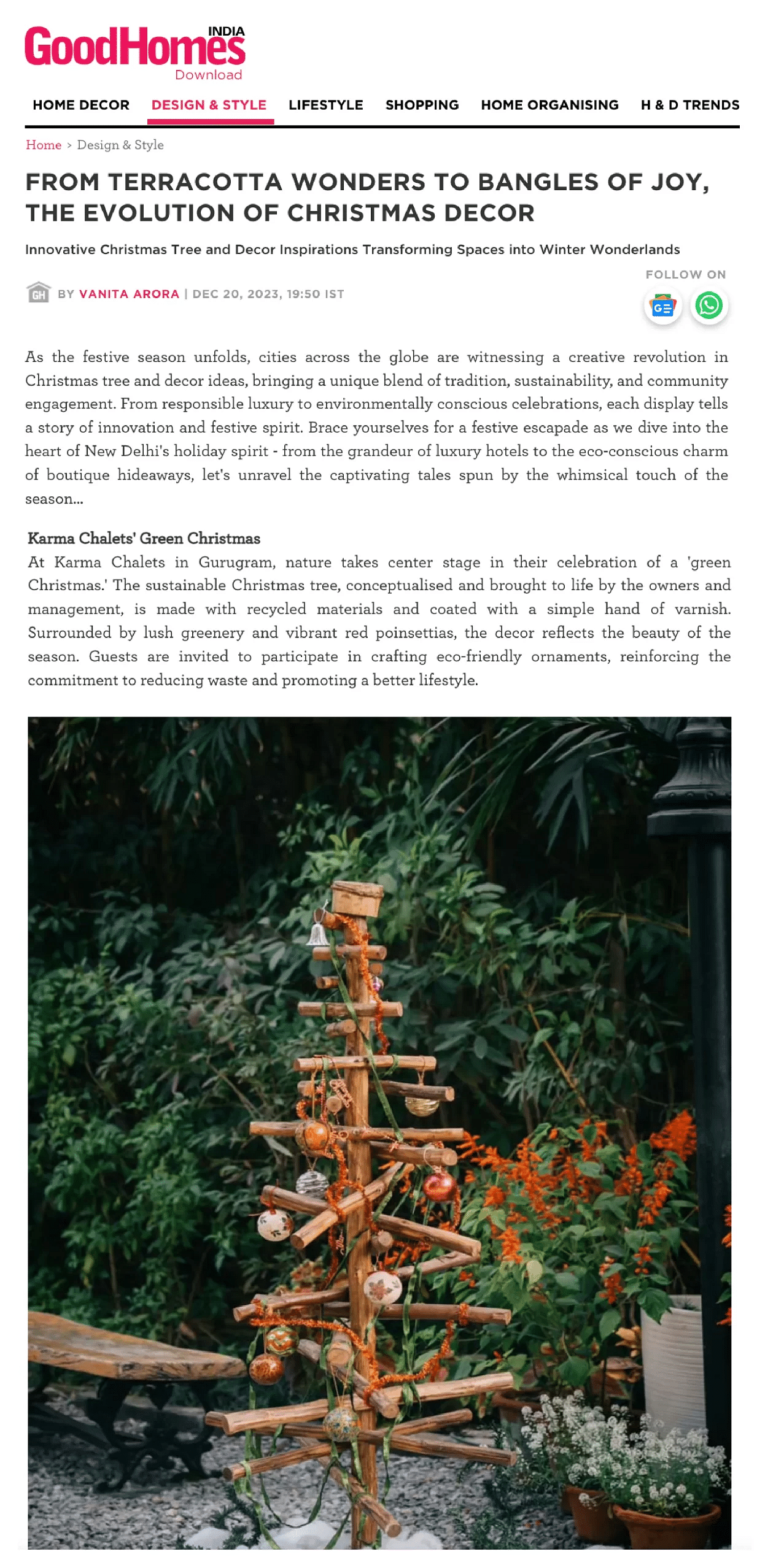 Screenshot of a GoodHomes India article featuring a wooden Christmas tree decorated with ornaments at Karma Chalets, set in a garden with plants and flowers.