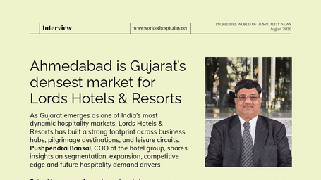 Interview article snippet featuring Pushpendra Bansal, COO of Lords Hotels & Resorts, discussing Gujarat hospitality expansion in World of Hospitality News August 2026 issue.