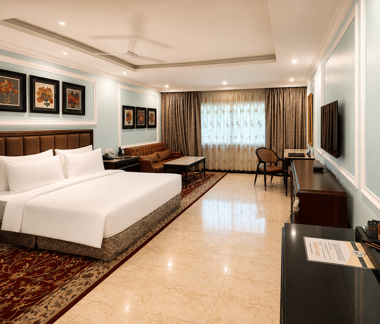 Standard Deluxe Room with king-size bed and elegant interiors at MAYFAIR Lake Resort, Raipur