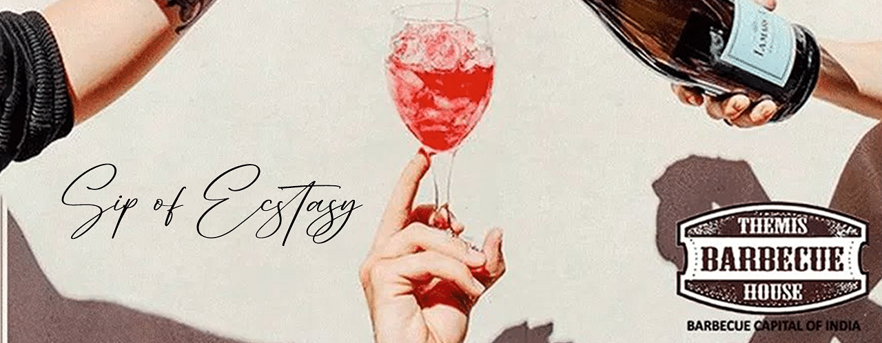 A creative image of a glass of beverage at Themis Barbecue House