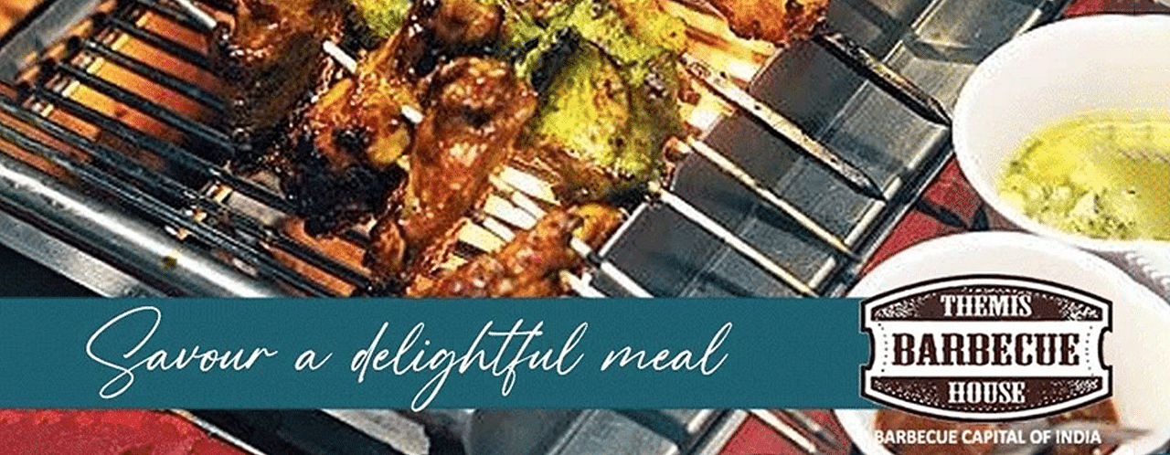 A creative image of a barbecue grill with meat at Themis Barbecue House