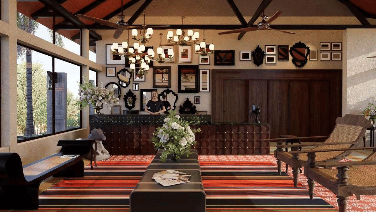 A reception centre features seating, tables, and a desk. A chandelier hangs from the ceiling. Windows line the wall.