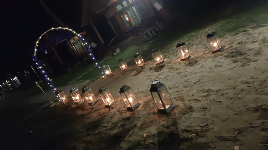 lanterns placed on either side for a grand entrance