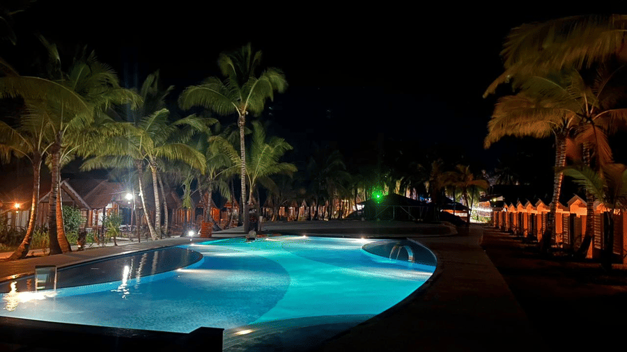 A pool with Havelock Cottage View at Symphony Palms Beach Resort And Spa.