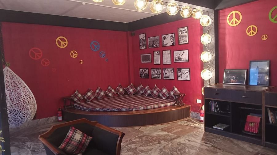 A living space with a round bedlike seating area at the corner