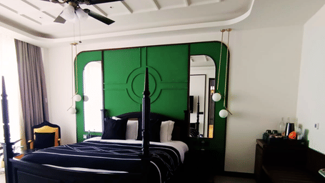 Contemporary bedroom with a unique headboard and modern décor - Polo Cherrapunjee Resort