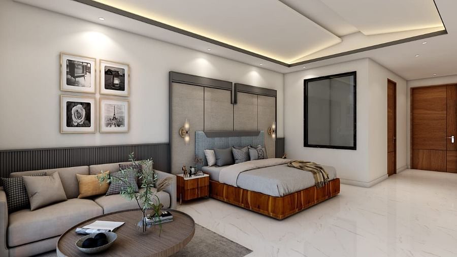 A spacious room featuring a double bed alongside a common seating area. - Namaste Corbett