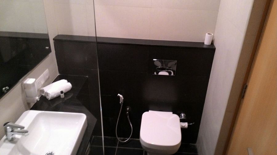 Sink area in view inside the Bathroom in one of the rooms -Starlit Suites, Kochi